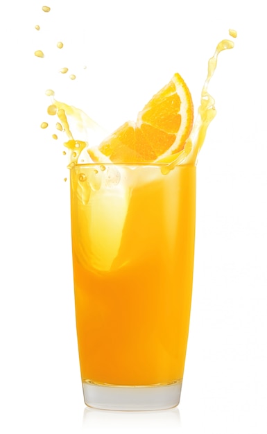 Glass of orange juice with splash and orange slice