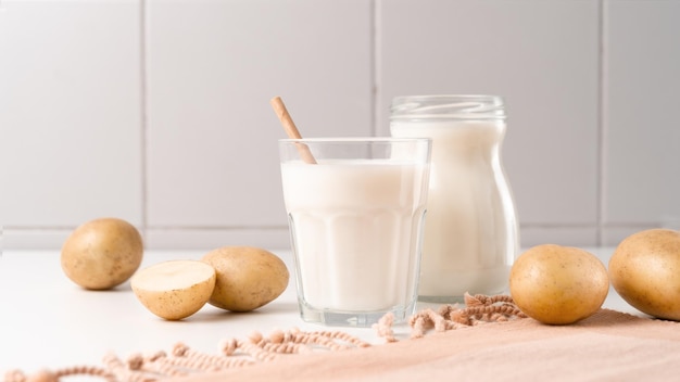 A glass of potato milk on the table Alternative PlantBased Milk