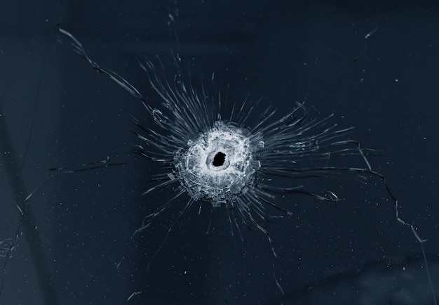 Photo glass punctured by a bullet