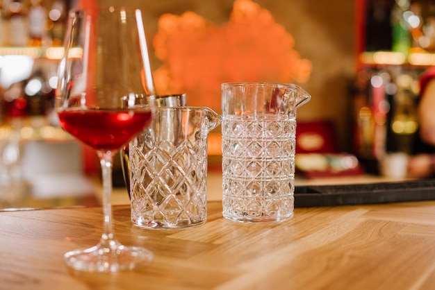 A glass of red wine on the bar table