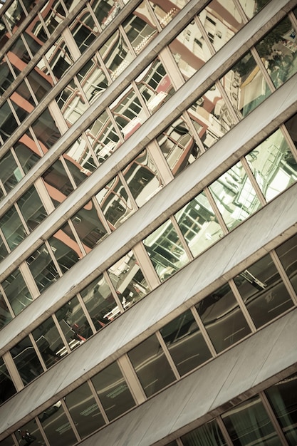 Glass Skyscraper Building Facade with Street Reflections