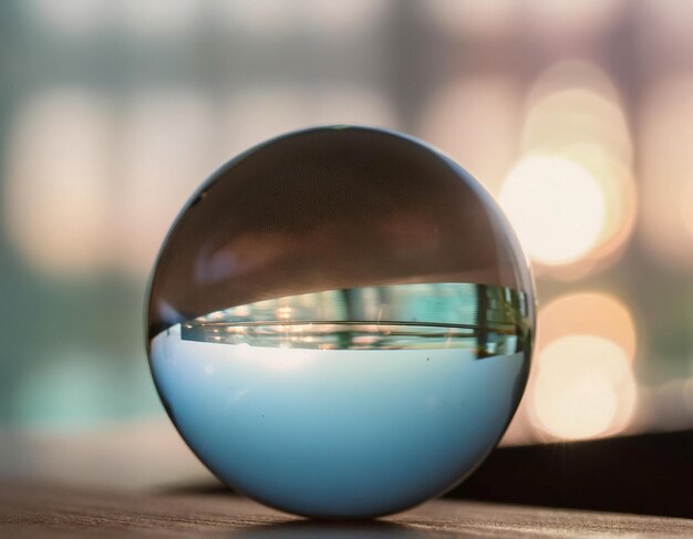 Photo glass sphere showcasing reflection transparency and geometric perfection