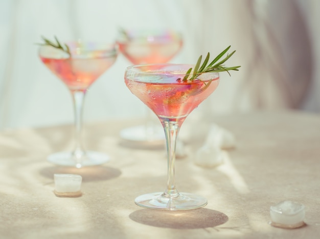 Glass of strawberry cocktail or mocktail, refreshing summer drink with crushed ice and sparkling water