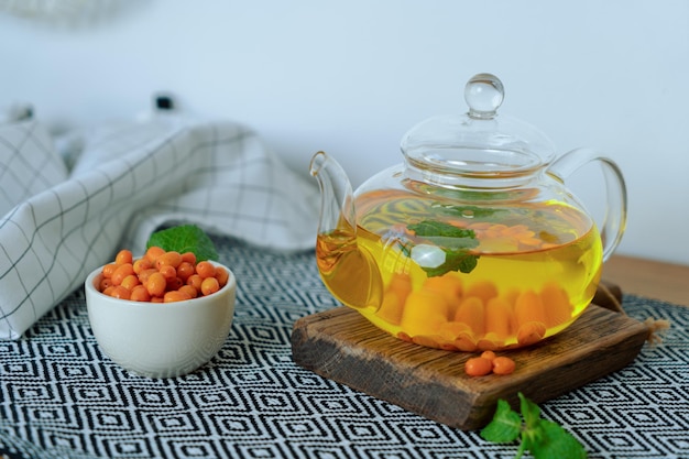 Glass teapot with tea