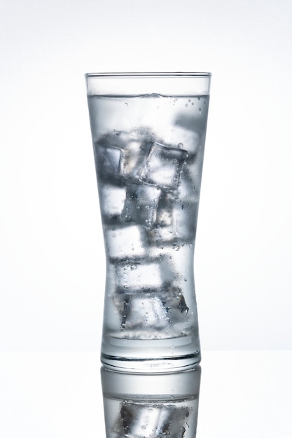 Glass of water with ice macro shot