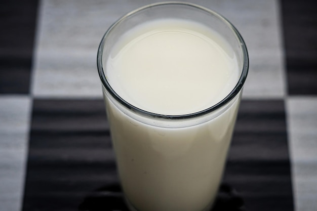 a glass of white milk premium photo