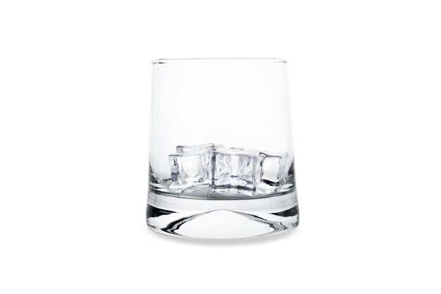 Glass with ice cubes, isolated on white.