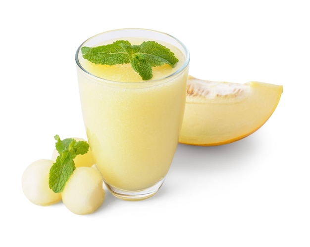 Glass with melon smoothie on white background