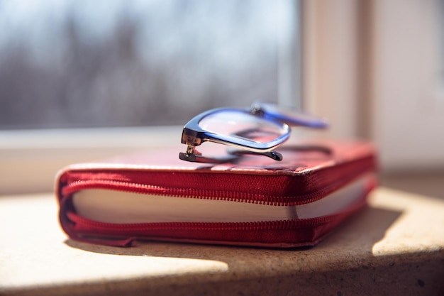 Glasses on book