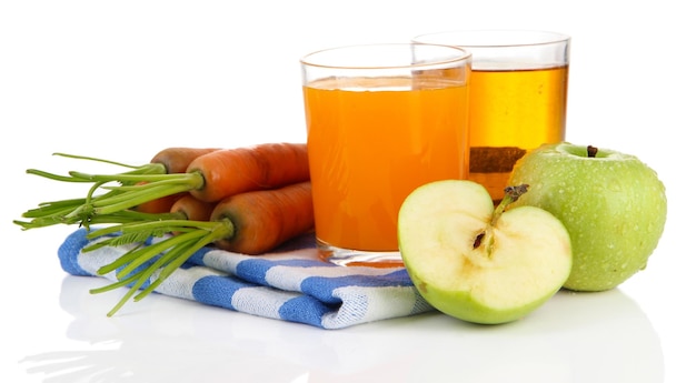 Glasses of juice apples and carrots isolated on white