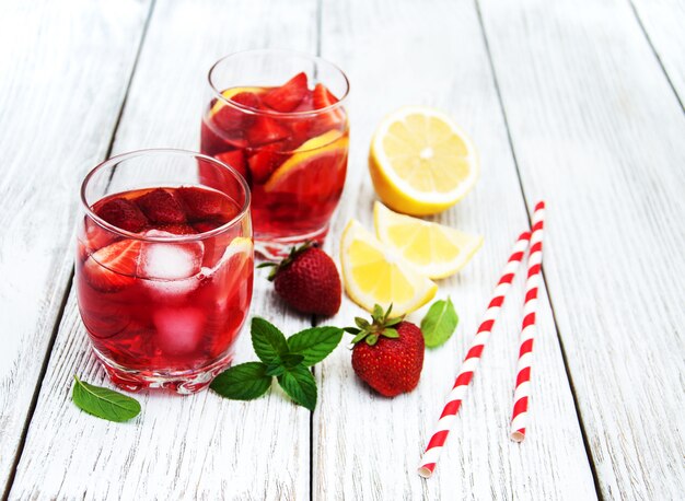 Glasses of lemonade with strawberries