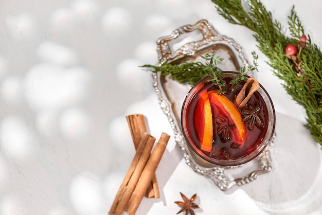 Glasses of mulled wine with orange and cinnamon Selective focus