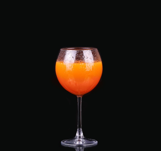 Glasses of organic juices isolated on the black