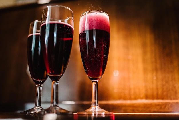 Glasses with champagne on table Party and holiday celebration concept