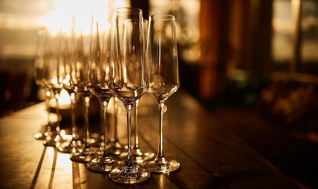 glasses with champagne wine glasses with alcohol on a bokeh background