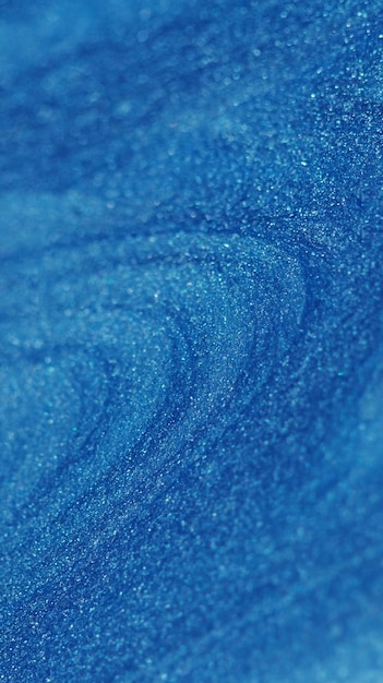 Glitter fluid paint flow blue wet texture ink wave