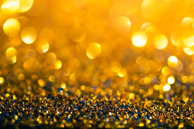 Glitter gold lights grunge background