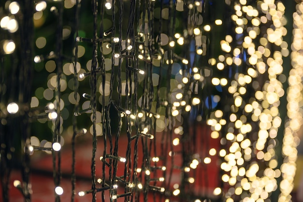 Glittering string lights with bokeh shining decoration on Christmas Eve