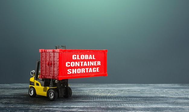 Global container shortage and a forklift Problems of the international freight transport system Imbalance high prices for the transportation of goods Consequences of economic slowdown