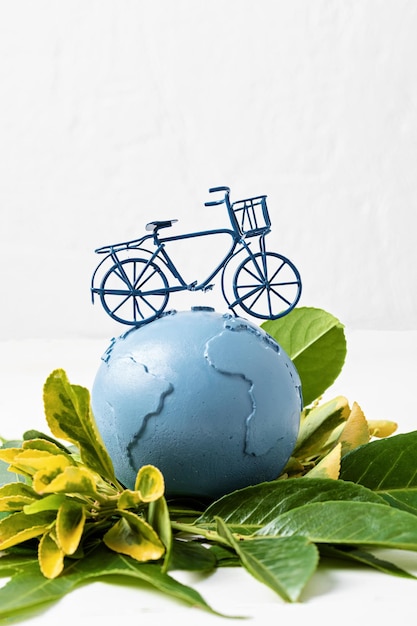 Globe and bicycle Save the planet idea International Earth Day World Bicycle Day