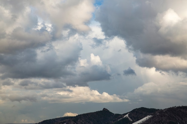 Gloomy sky with gray clouds Rainy weather climate Clouds background with copy space