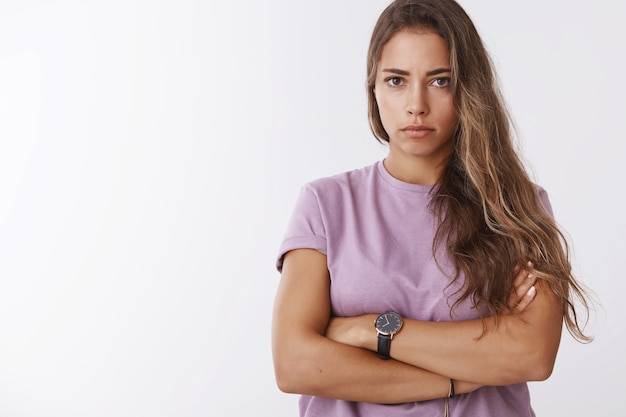 Gloomy sulking girlfriend offended looking bothered intense jealous cross hands chest defensive pose, frowning pouting grimacing disapproval, waiting apology insulted, boyfriend forgot birthday