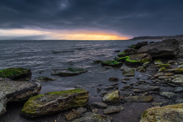 Gloomy sunrise on the seaside