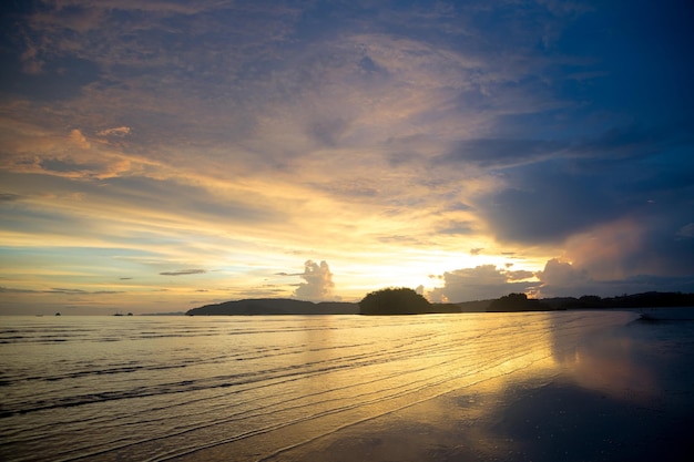 Gloomy tropical sunsetSunset over Water and IslandsThailand Krabi Province Ao Nang Beach