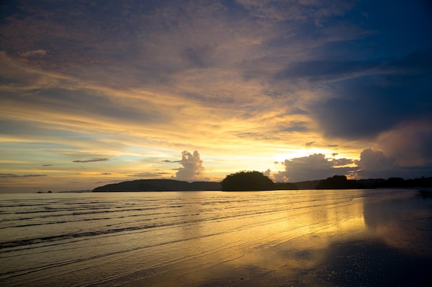 Gloomy tropical sunsetSunset over Water and IslandsThailand Krabi Province Ao Nang Beach