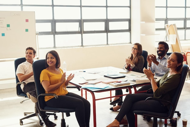 Glorify the success Shot of creative employees having a meeting in a modern office