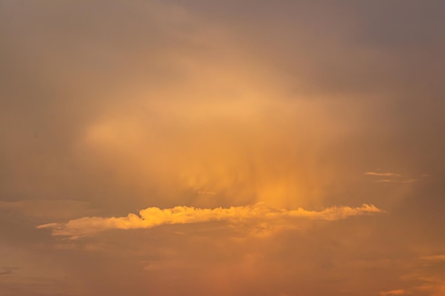 Glow dramatic colorful rain cloud sky sunset with twilight color golden sky and clouds Gradient color Sky texture abstract nature background