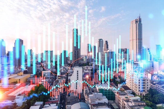 Glowing FOREX graph hologram aerial panoramic cityscape of Bangkok at sunset Stock and bond trading in Asia The concept of fund management Double exposure