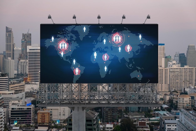 Glowing hologram of Earth planet map on billboard over aerial panoramic cityscape of Bangkok at sunset The concept of international business in Southeast Asia