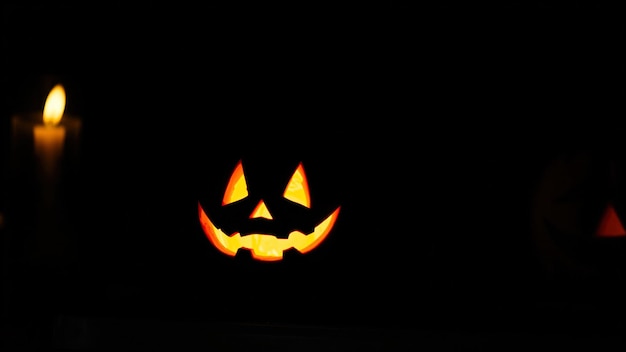 Photo glowing jackolantern in the dark