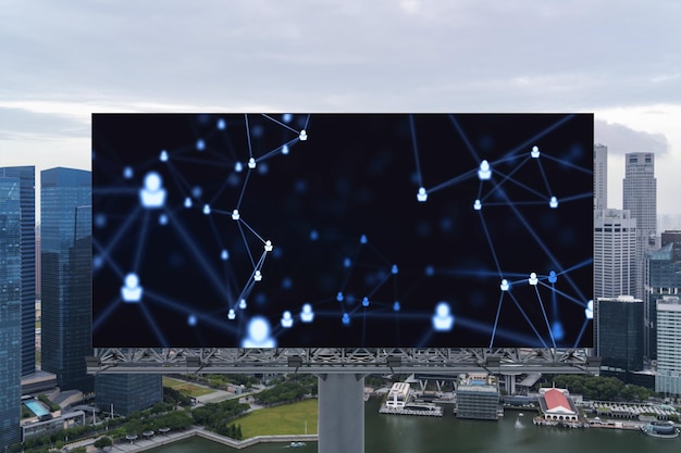 Glowing Social media icons on road billboard over panoramic city view of Singapore Southeast Asia The concept of networking and establishing new connections between people and businesses