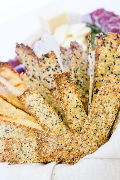 Gluten free crackers with seeds and quinoa flakes.