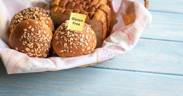 Gluten free label on basket of bread and buns