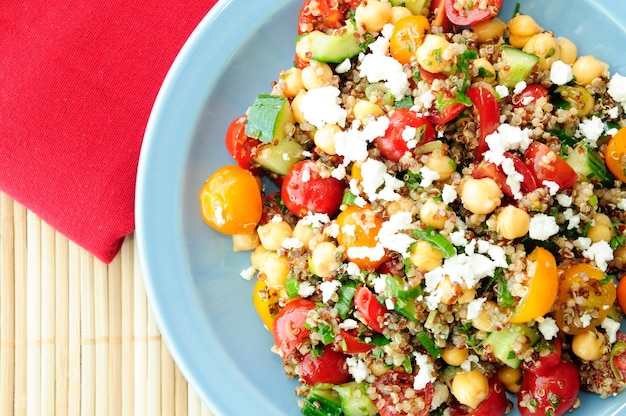 Gluten free vegetarian salad made with quinoa, chickpeas, feta a