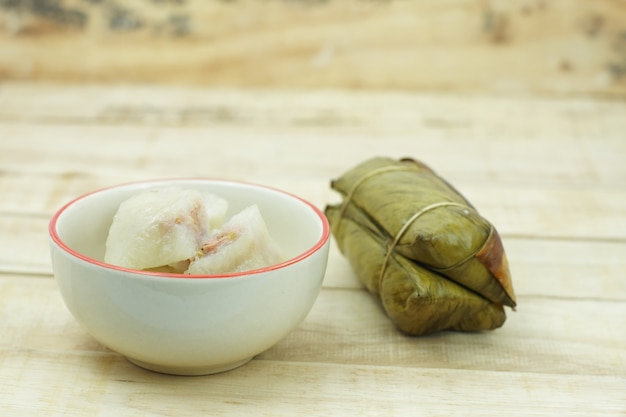 Glutinous rice steamed in banana leaf