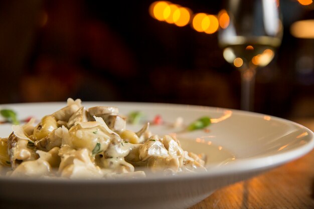 Gnocchi with turkey meat and porcini mushrooms in a cream sauce