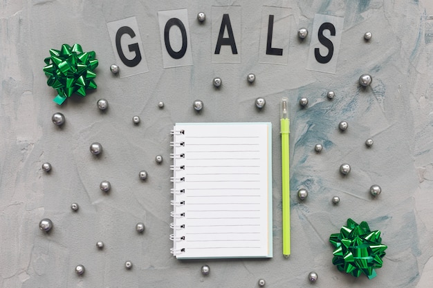 GOALS word and to do list on gray and blue 