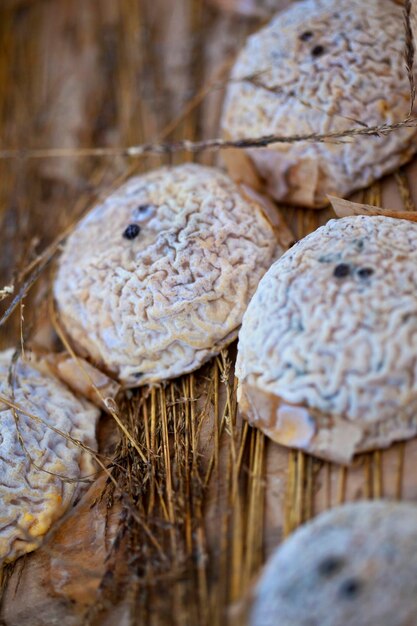 Goat cheese in a wooden box on a market stall