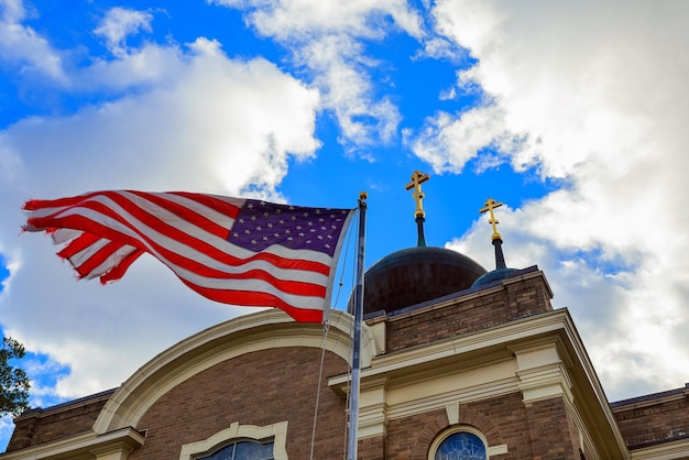 God Bless America American flag and church steeple church sky American Flag