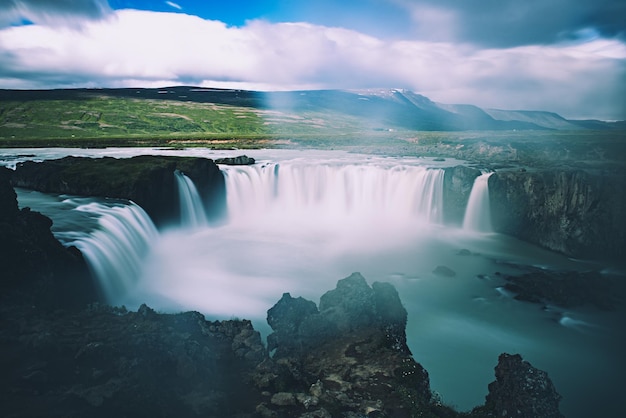 Godafoss waterfall in Iceland, summer natural travel background