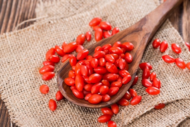 Goji Berries on a wooden spoon