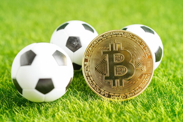 Gold bitcoin with soccer ball or football cryptocurrency used in online sports betting