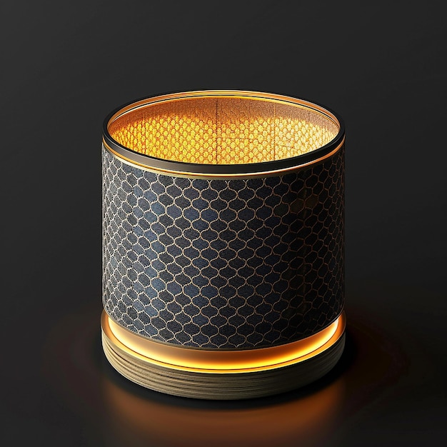 a gold and black container with a gold pattern on it