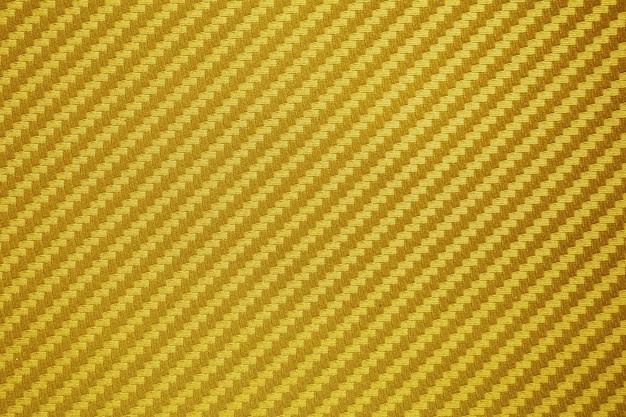 Gold carbon fiber composite raw material background