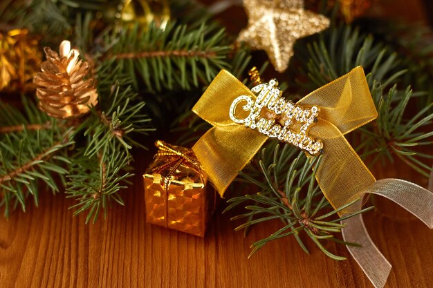 Gold christmas decorations with fir branches