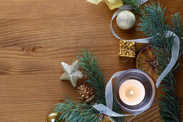 Gold christmas decorations with fir branches